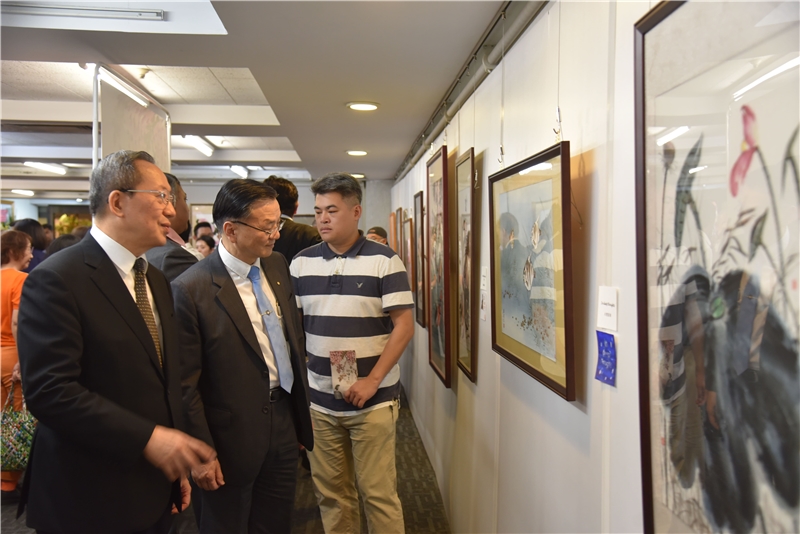 Distinguished guests tour the exhibition.