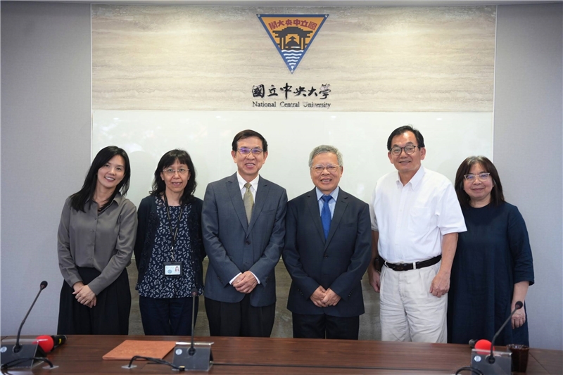Group photo of the signing ceremony attendees